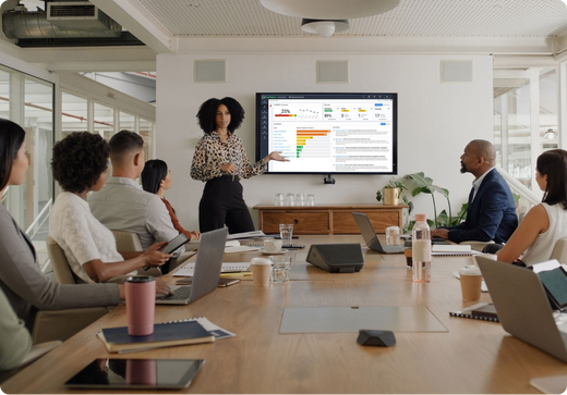 Group of professionals sitting together in a workplace setting.