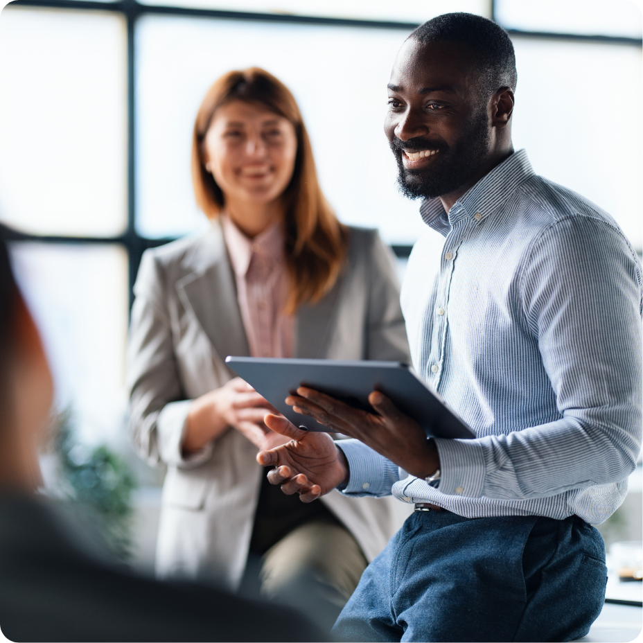 Group of professionals sitting together in a workplace setting.