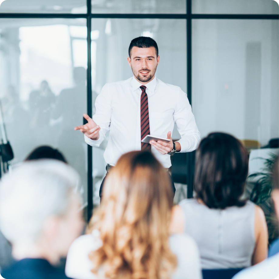 Group of professionals sitting together in a workplace setting.
