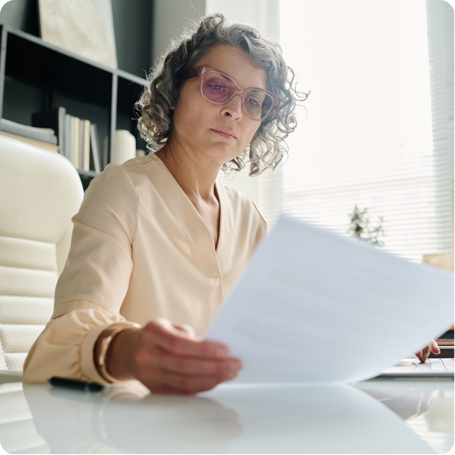 Professional reviewing project performance report.